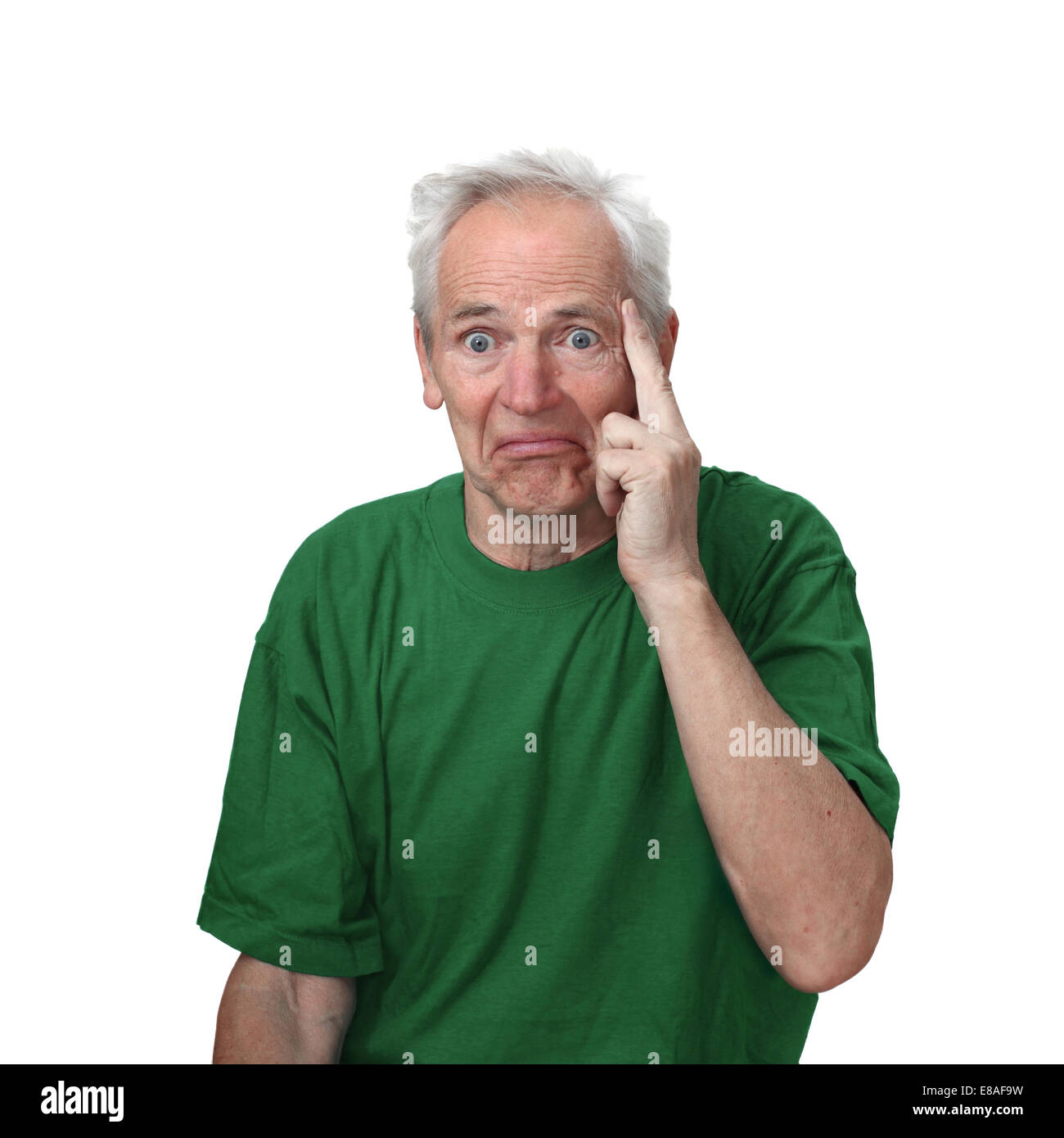 Senior man with discouraged face put fingers to his temple isolated on white background. Discourage and frustration Stock Photo