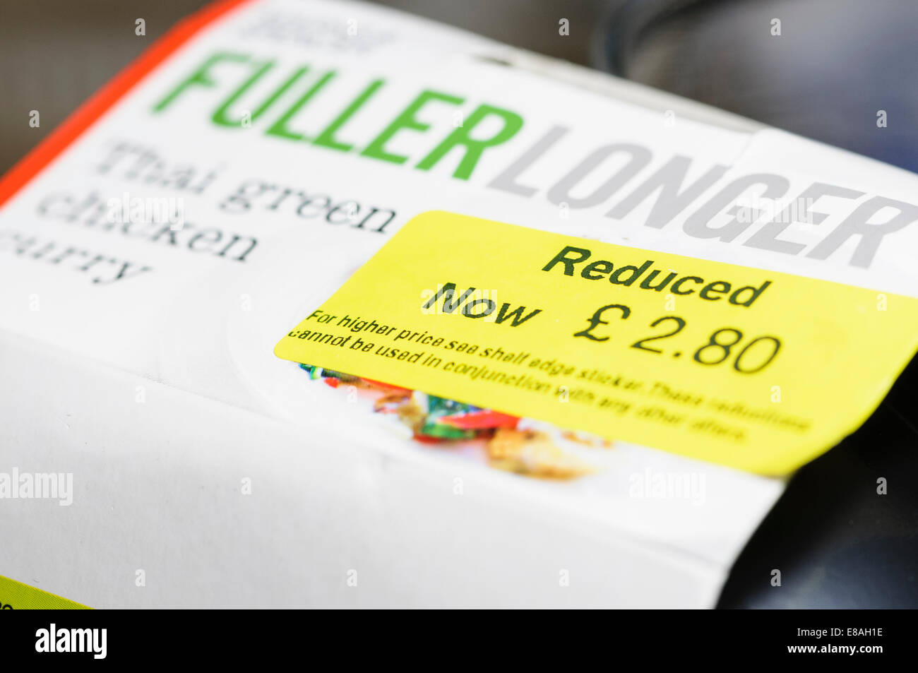 Reduced price label on a Marks and Spencer Fuller Longer ready meal Stock Photo