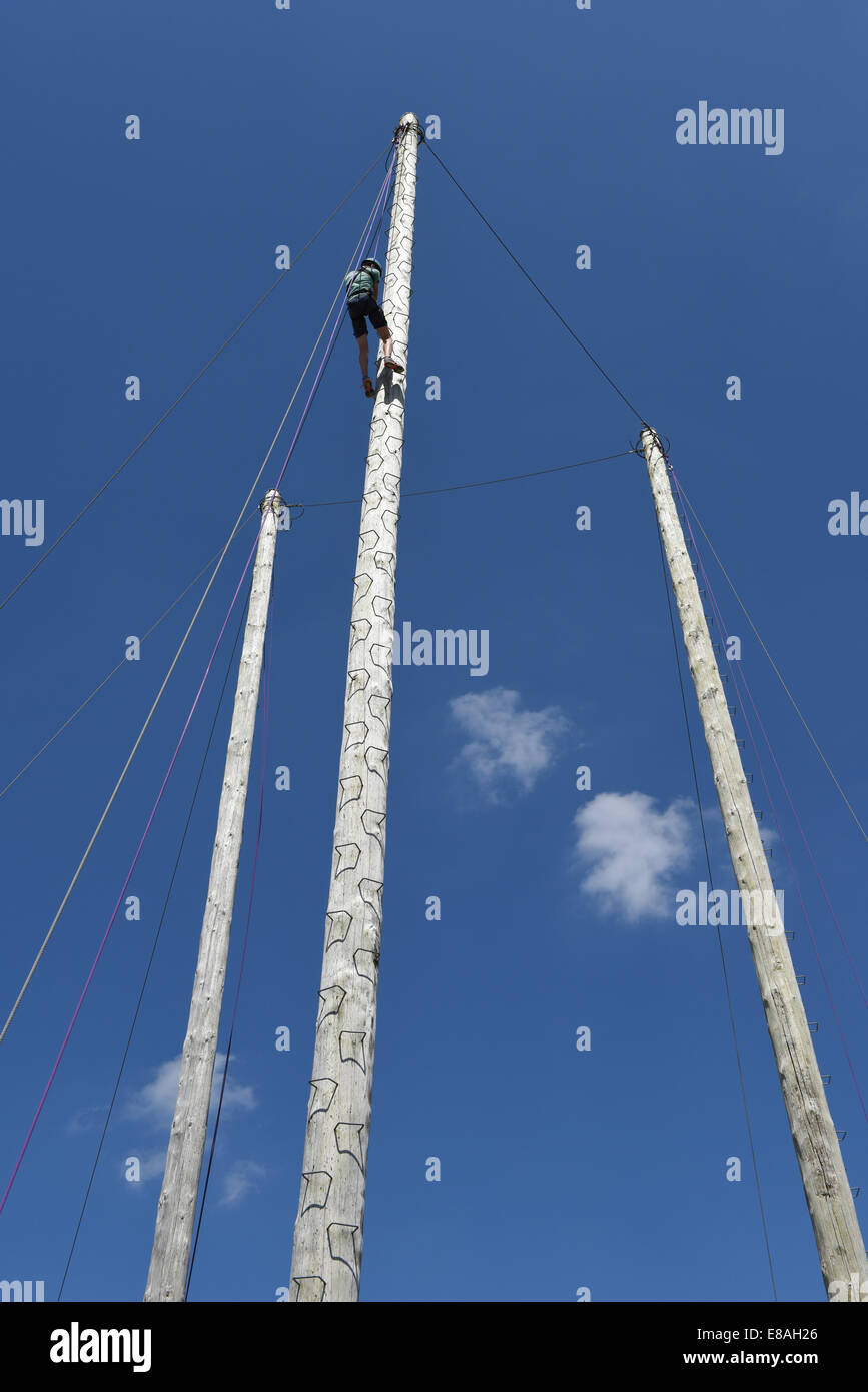 A single person Pole climbing at the new forest show Stock Photo