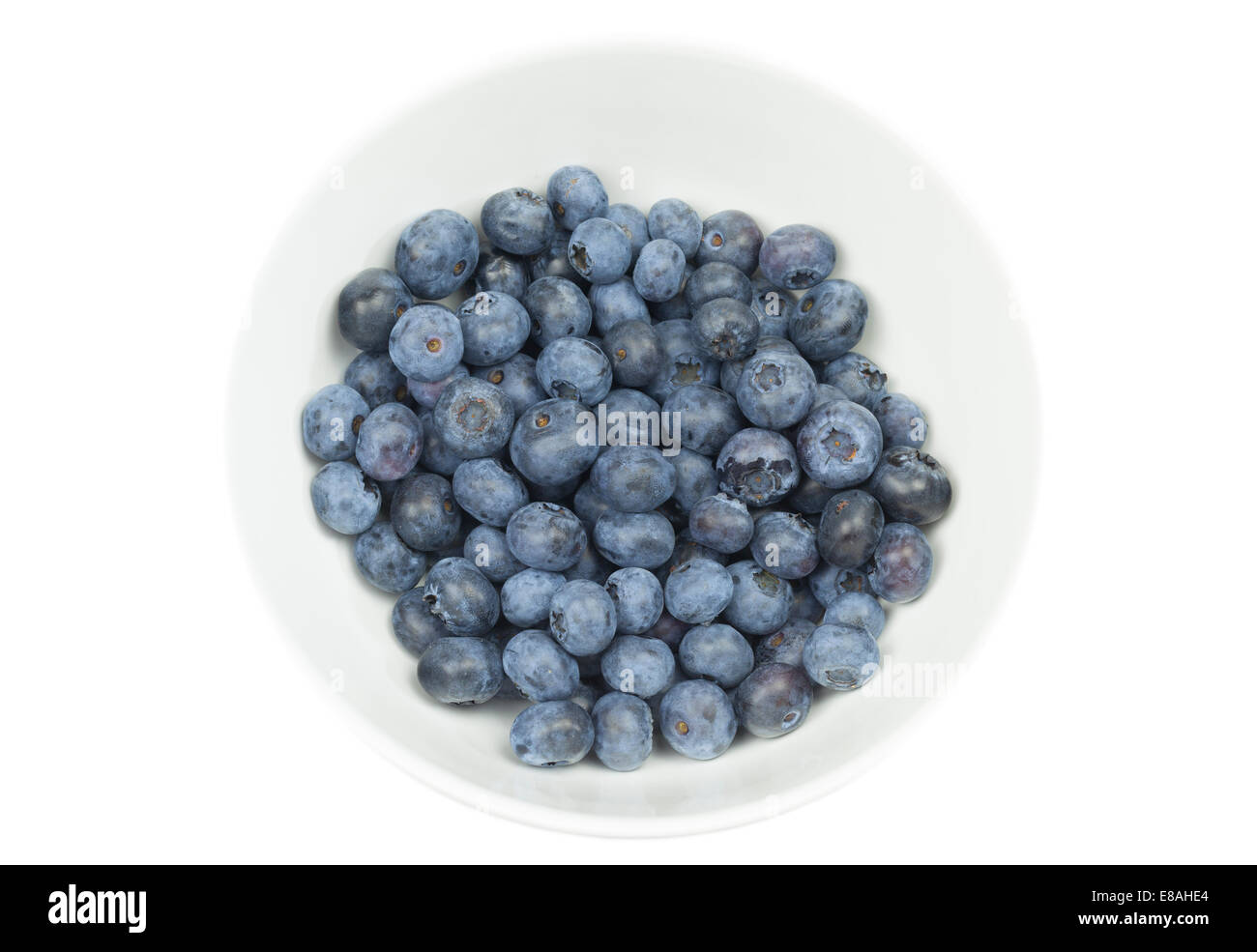 Blueberries in a bowl isolated on a white background Stock Photo