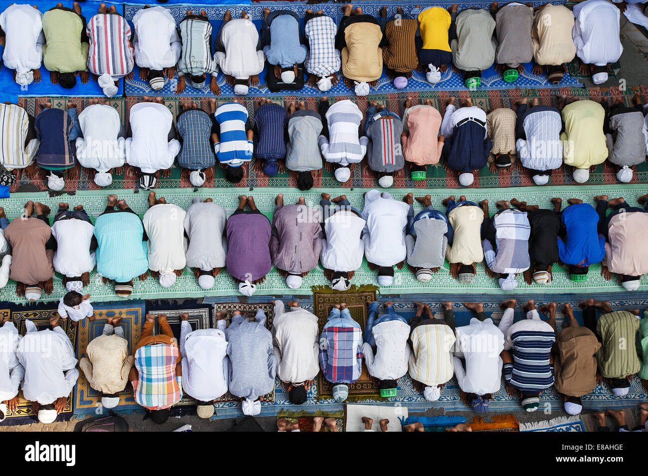 Muslim Friday salat prayer jumu'ah outside Jama Mosque masjid in Bandra, Mumbai, India. Stock Photo