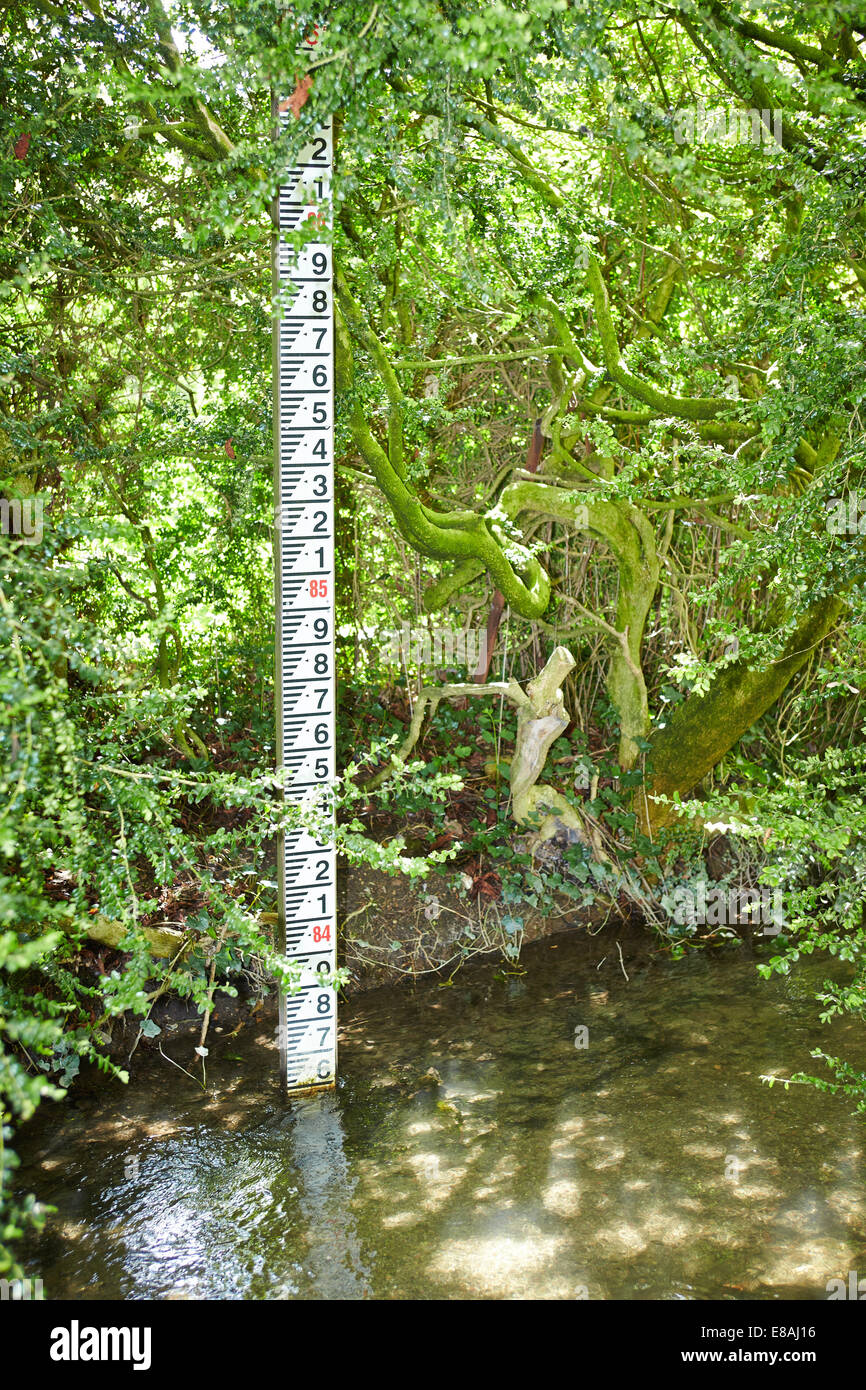 Large river level gauge on the Letcombe Brook, a rare chalk stream, in Wantage Stock Photo