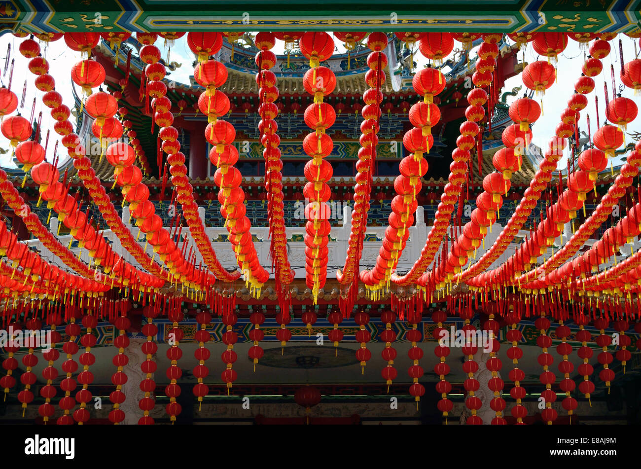 Red lanterns hanging in rows in temple to celebrate Chinese new year ...