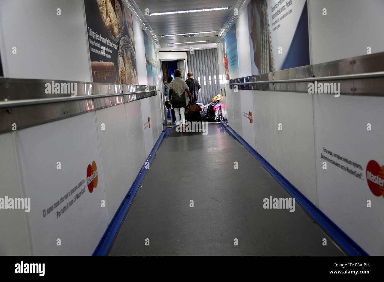 Athens Greece Athens International Airport Passengers Boarding Aeroplane Through A Docking Arm Stock Photo