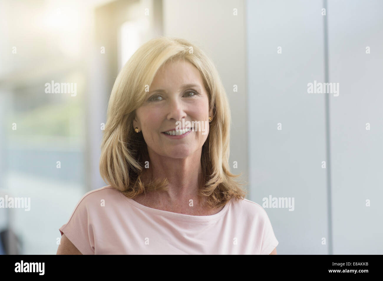 Mature woman with blonde hair, portrait Stock Photo