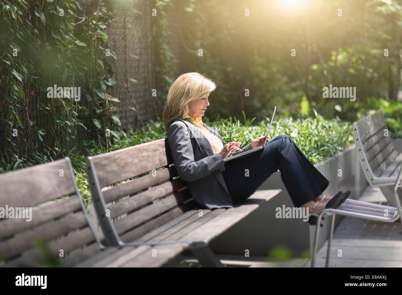 Leg woman sitting on bench hi-res stock photography and images - Alamy