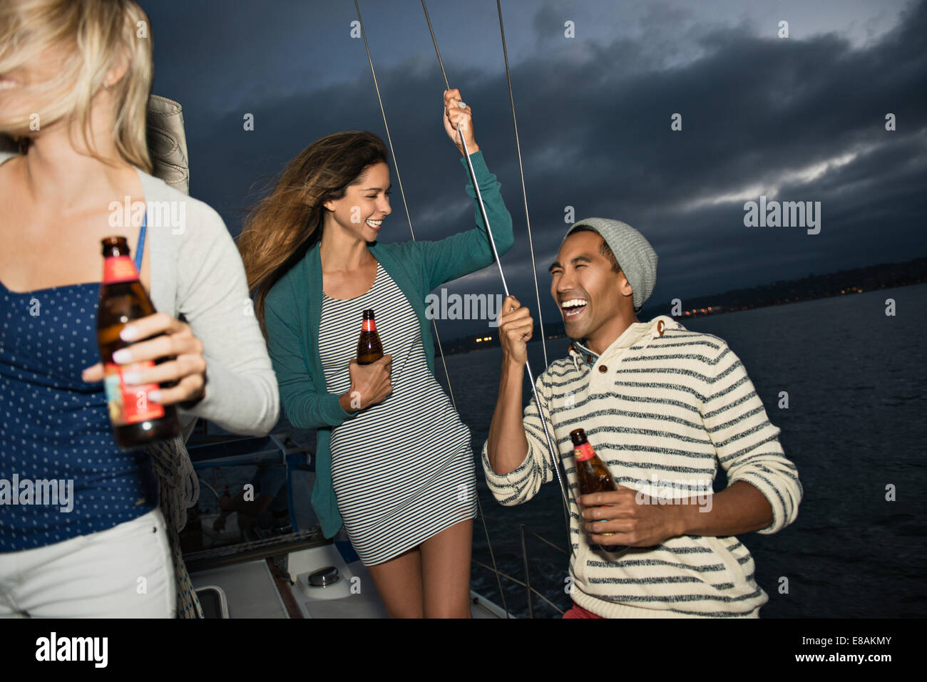 Friends on sailing boat with beer Stock Photo