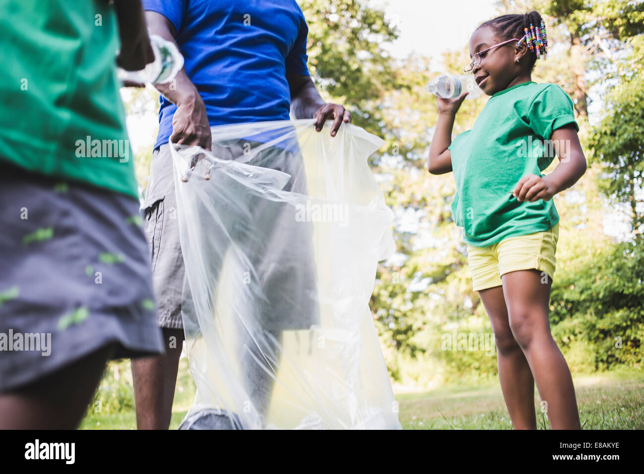 Children picking up litter hires stock photography and images Alamy