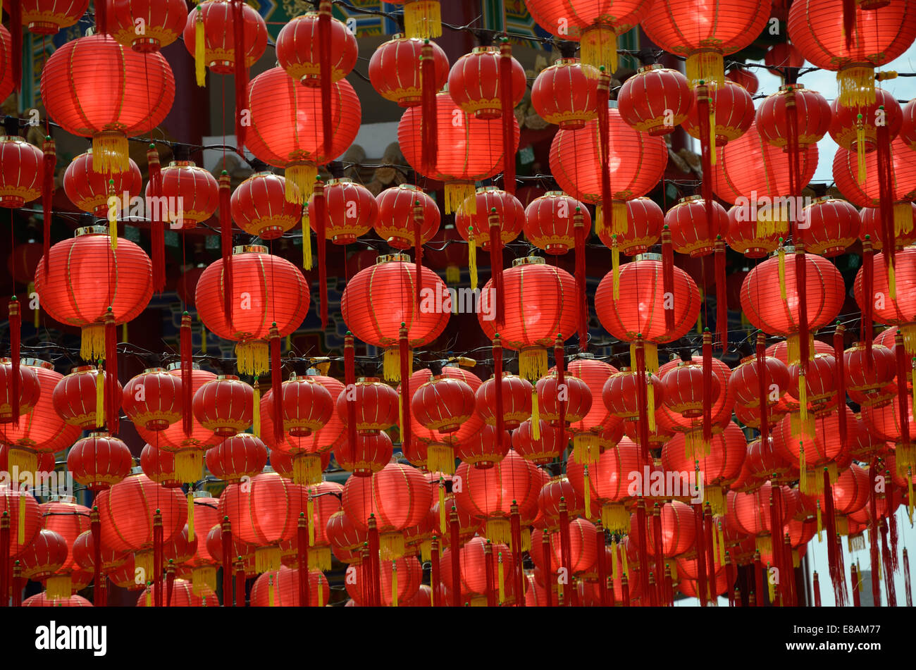 Red lanterns hanging in rows in temple to celebrate Chinese new year ...