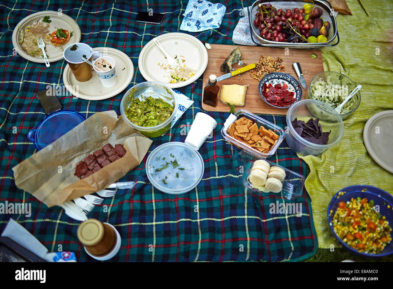 Picnic blankets with variety of fresh home prepared food Stock Photo