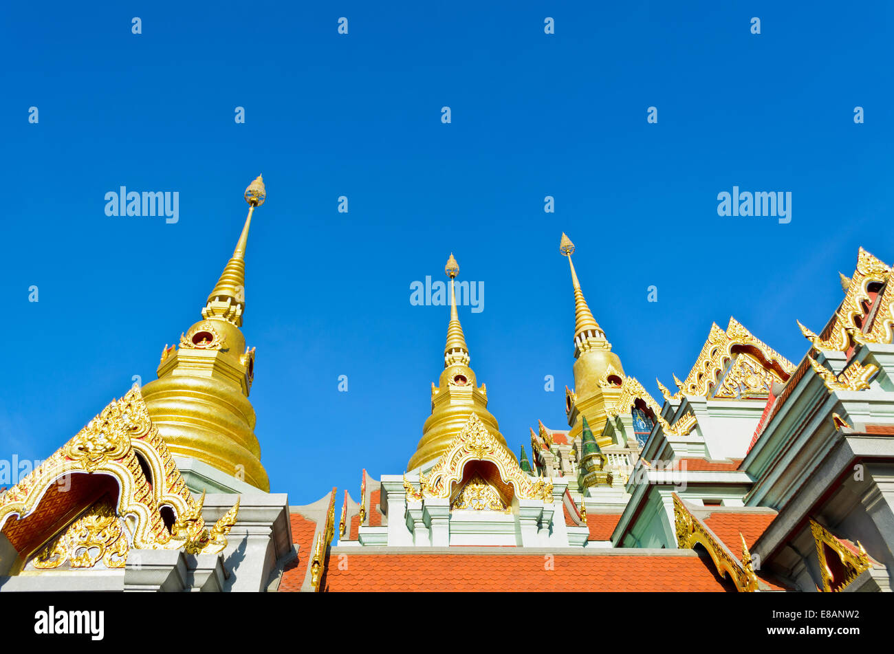 Pinnacle at Phra Mahathat Chedi Phakdi Prakat, Beautiful golden pagoda's famous on Thongchai mountain in Ban krut, Prachuap Khir Stock Photo