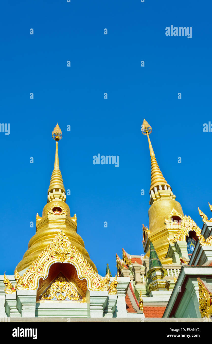 Pinnacle at Phra Mahathat Chedi Phakdi Prakat, Beautiful golden pagoda's famous on Thongchai mountain in Ban krut, Prachuap Khir Stock Photo