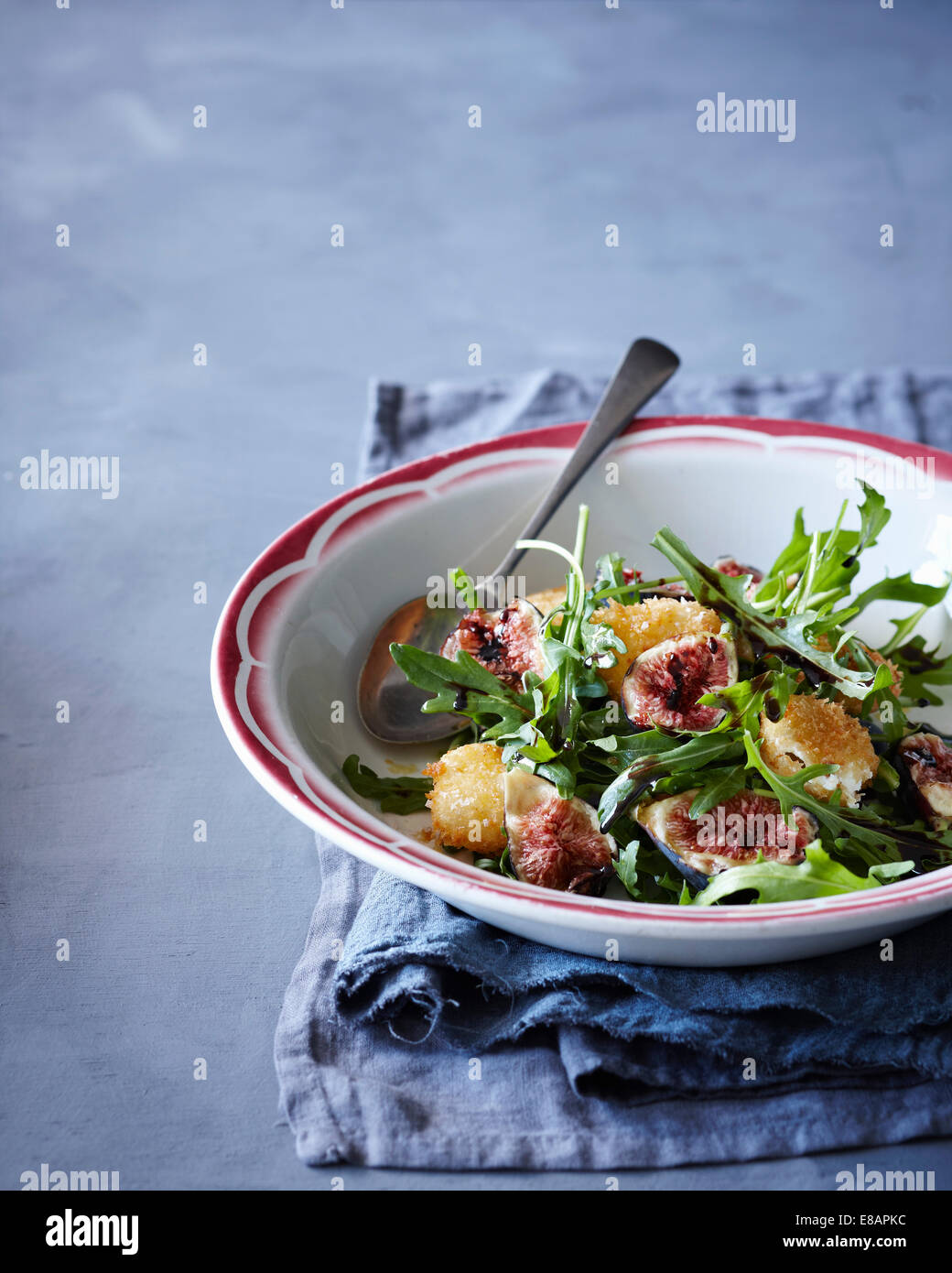 Fig, goats cheese and rocket salad Stock Photo