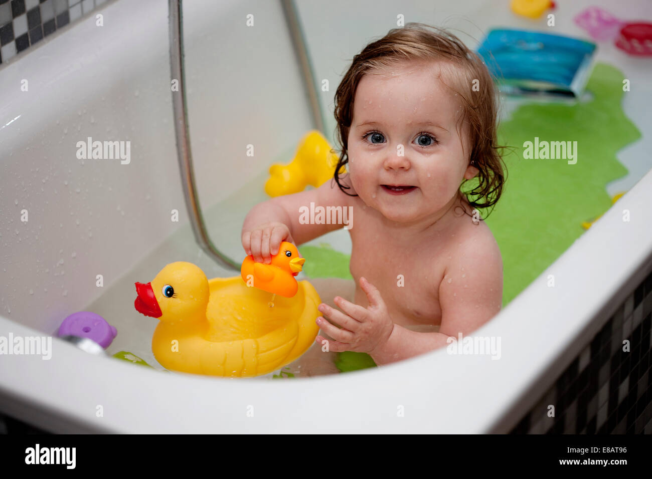 Young girl in bath Stock Photo - Alamy