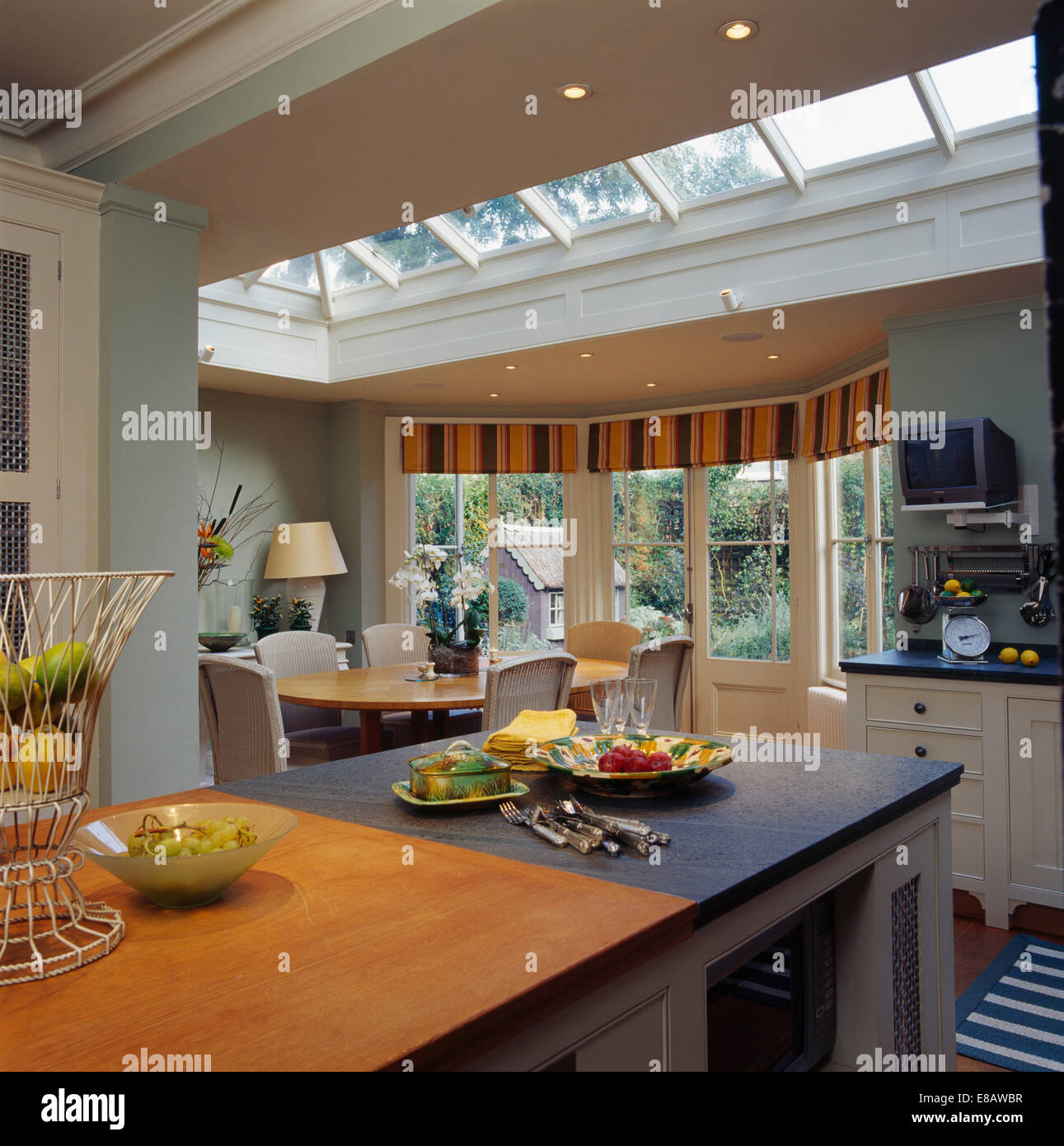 Large modern kitchen extension with dining area in front 