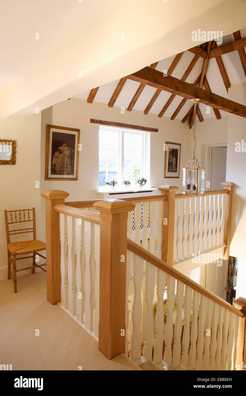 White Painted Wooden Banisters On Country Landing With Cream