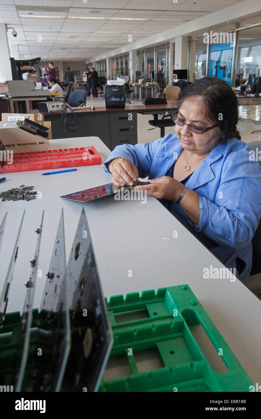 Detroit, Michigan - A worker for A123 Systems assembles circuit board for unmanned aerial vehicles (drones). Stock Photo