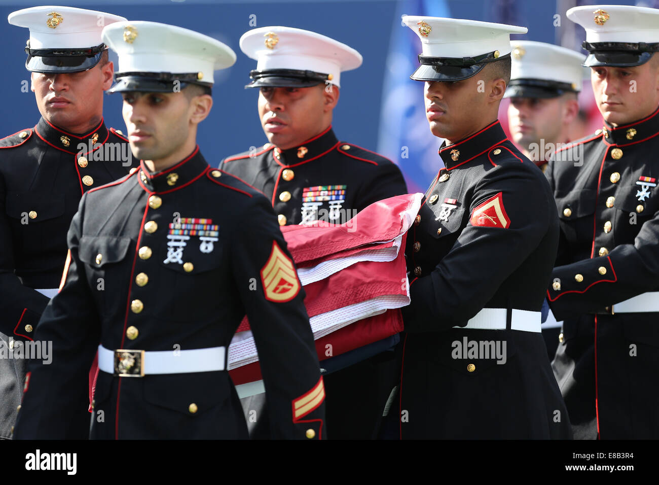 US Marine Corps unfold flag at ceremony,US Open 2014,New York,USA. Stock Photo