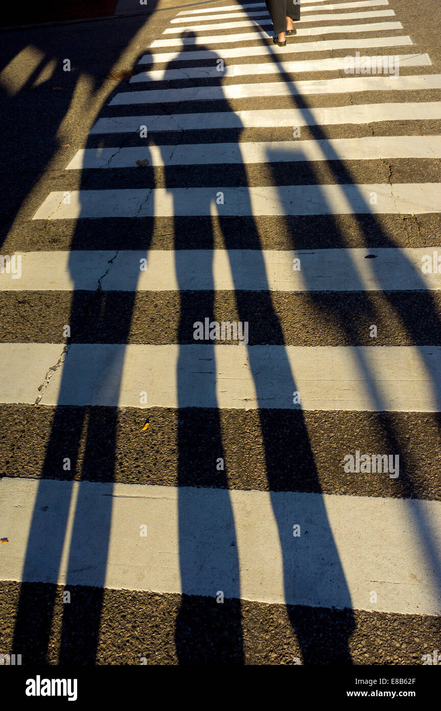 Two people crossing road silhouette hires stock photography and images
