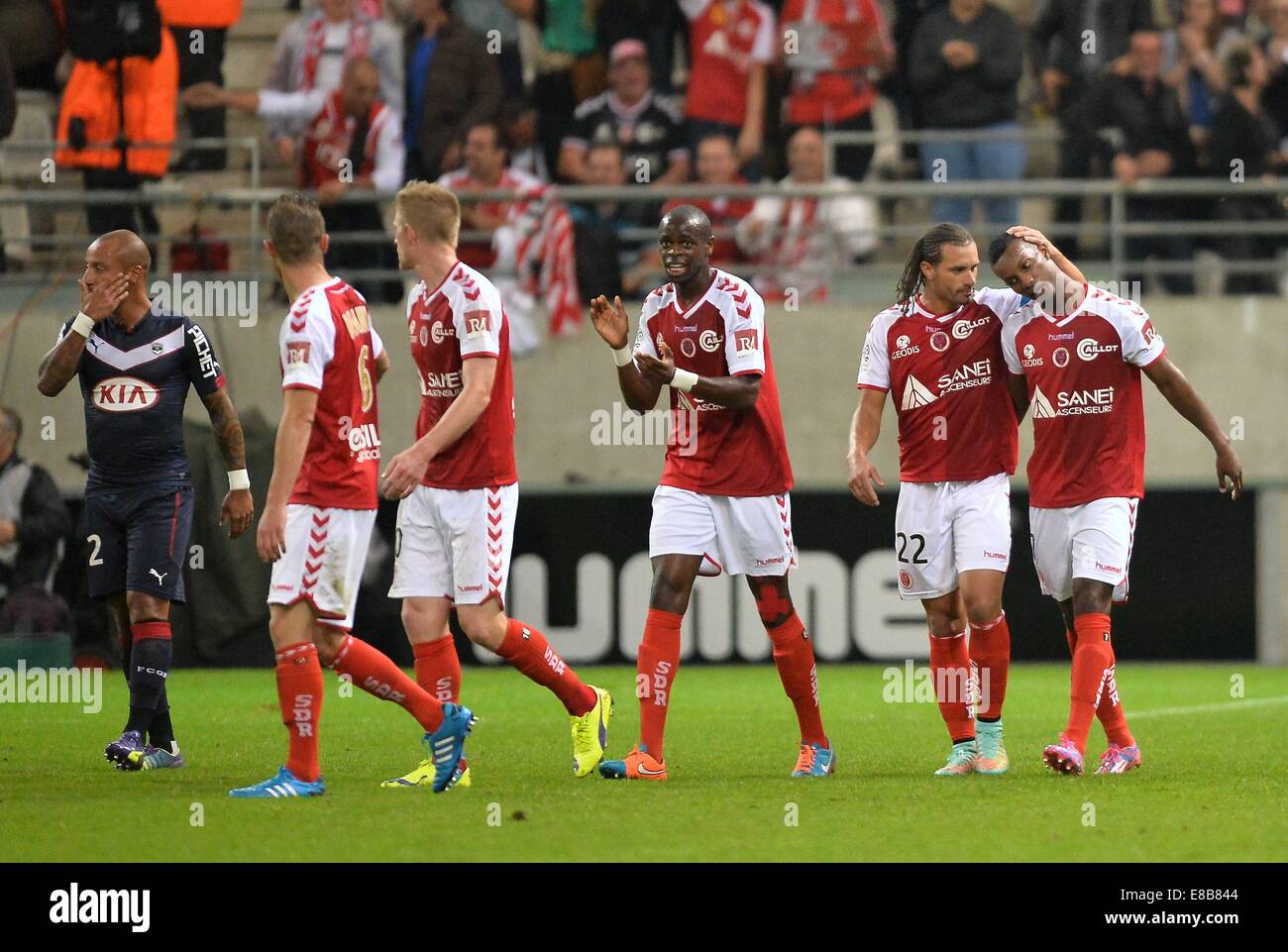 Rheims, France. 03rd Oct, 2014. French Division 1 League football. Reims versus Bordeaux. Odair Fortes (rei) and Mickael Tacalfred (rei) - Prince Oniangue (rei)celebrate their goal © Action Plus Sports/Alamy Live News Stock Photo