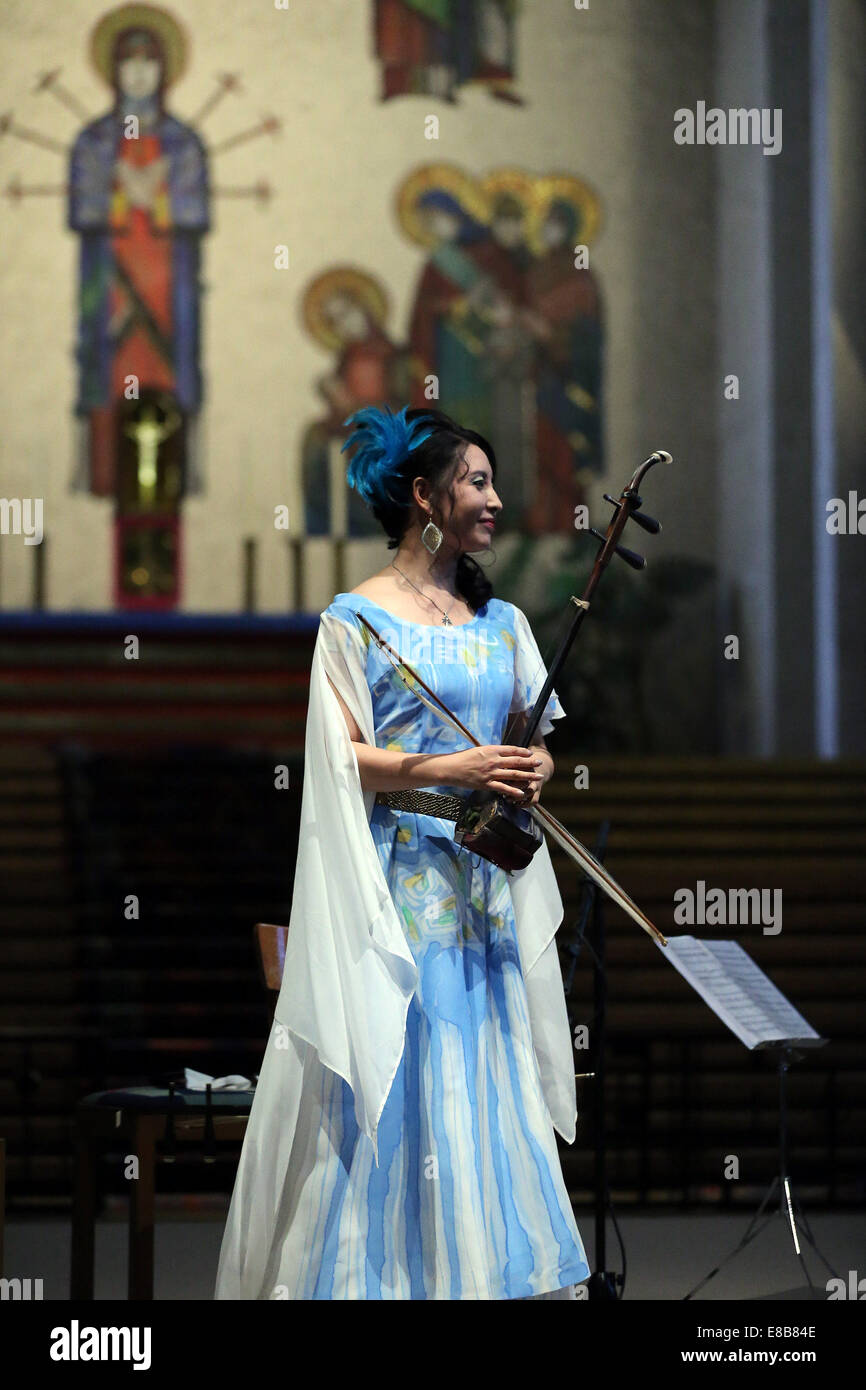Frankfurt, Germany. 3rd Oct, 2014. Chinese musician Ma Xiaohui reacts ...