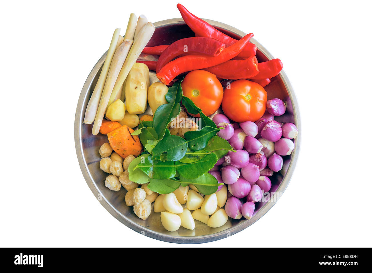 Fresh Ingredients for Cooking Southeast Asian Curry Dish Sauce with Chili Peppers Turmeric Ginger Lemon Grass Onions Shallots Li Stock Photo