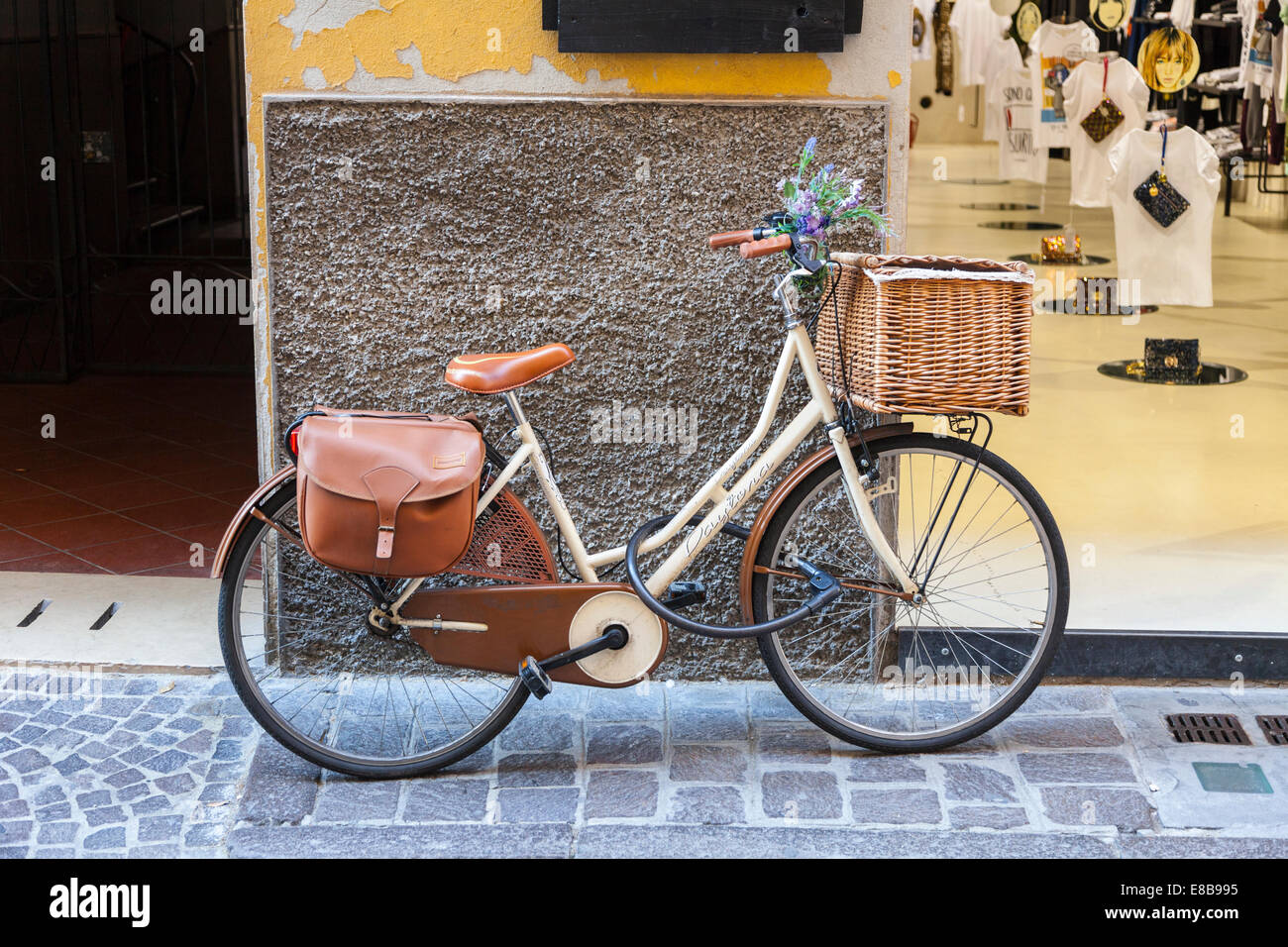 Old fashioned styled shopping bicycle with flower son handlebars, Parma