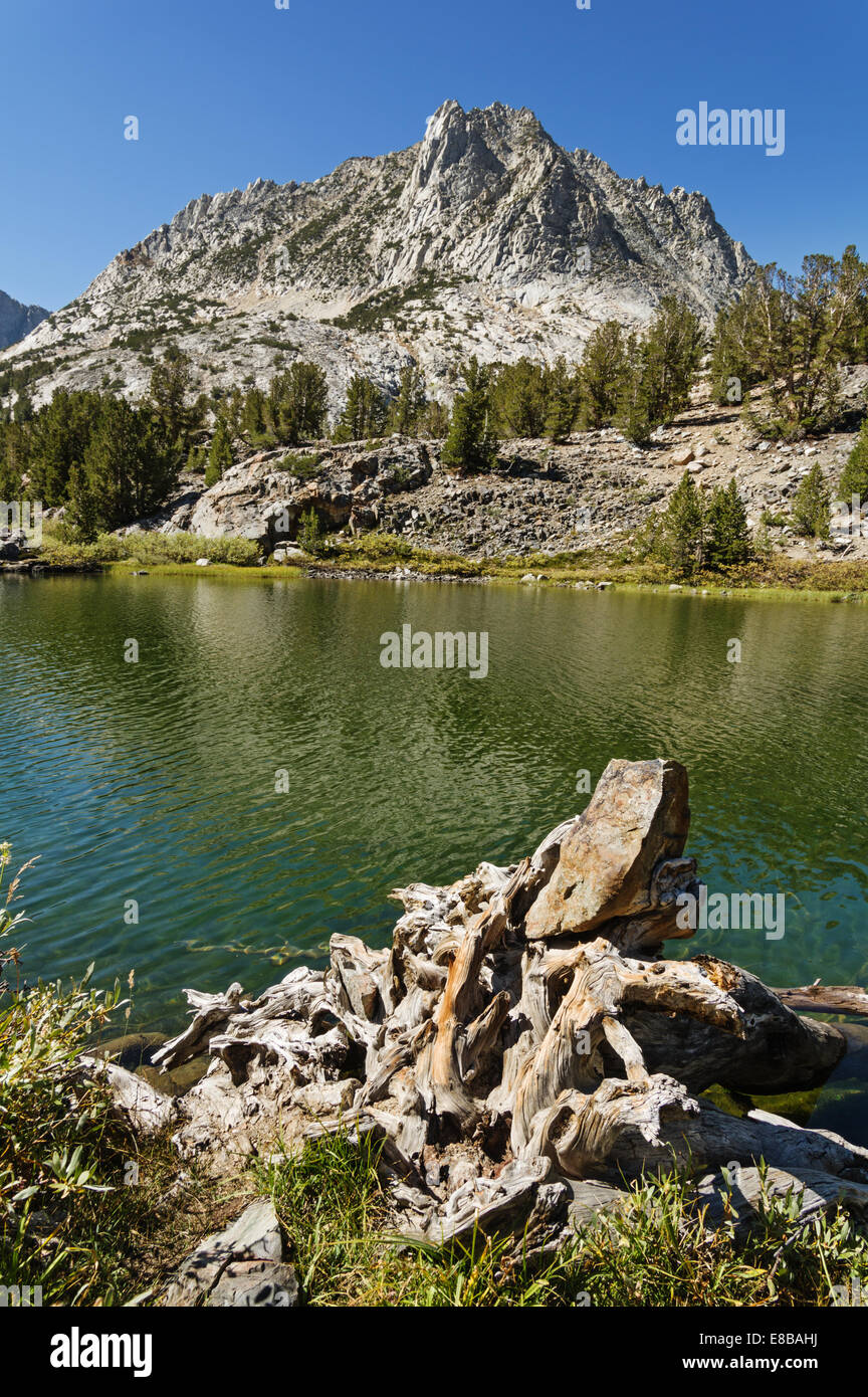 Hurd Peak looms above Long Lake in the Sierra Nevada Mountains near Bishop California Stock Photo
