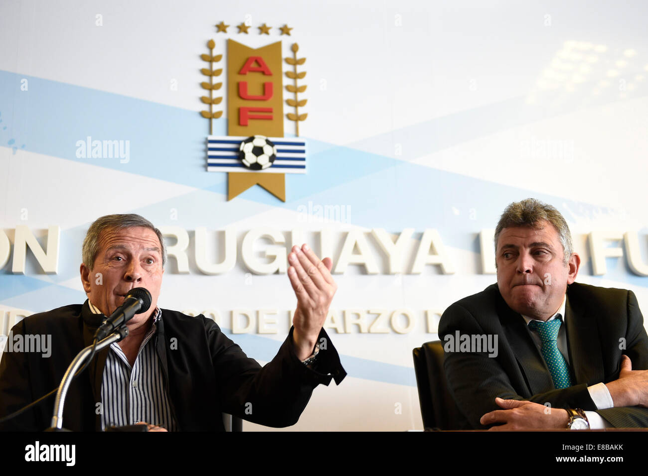 Montevideo, Uruguay. 3rd Oct, 2014. Uruguay's national soccer team head coach Oscar Washington Tabarez (L) and President of Uruguayan Football Association (AFU, for its acronym in Spanish) Wilmar Valdez attend a press conference held at the headquarters of AFU in Montevideo, capital of Uruguay, on Oct. 3, 2014. Tabarez renewed his contract with the AFU to lead the Uruguayan national soccer team until 2018 World Cup Russia. © Nicolas Celaya/Xinhua/Alamy Live News Stock Photo