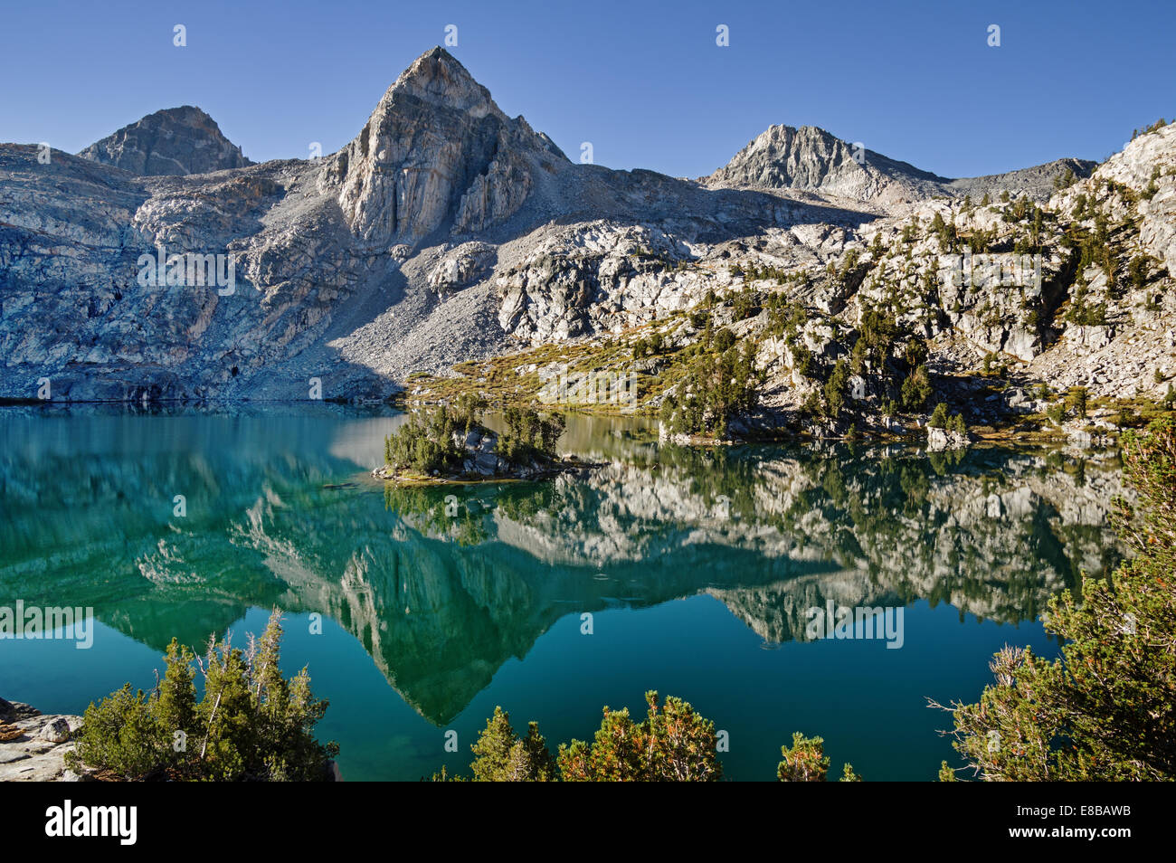reflection of Painted Lady Mountain in Rae Lake in Kings Canyon National Park Stock Photo