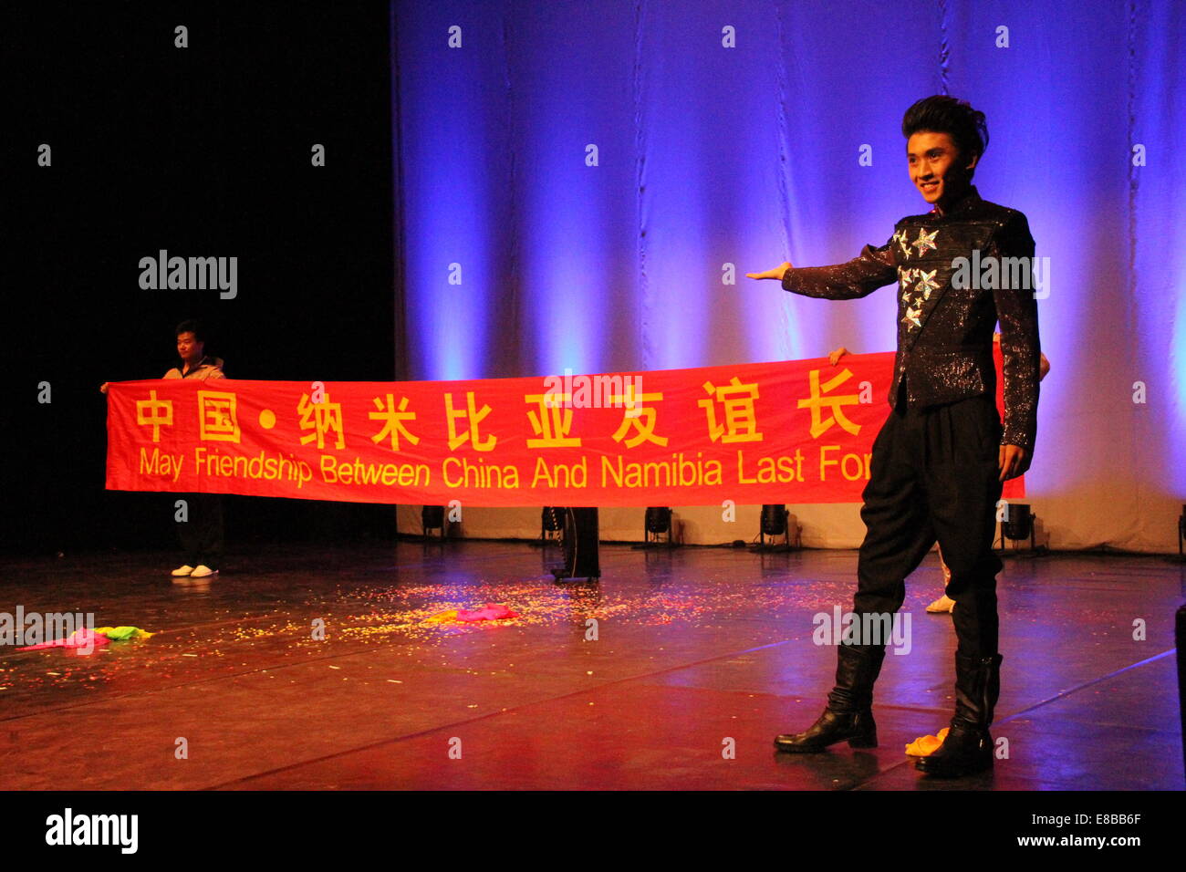 Windhoek, Namibia. 3rd Oct, 2014. Magician Yang Xiaolei from 'Beautiful Tianjin' troupe performs magic at the national theatre in Windhoek, Namibia, Oct. 3, 2014. © Gao Lei/Xinhua/Alamy Live News Stock Photo
