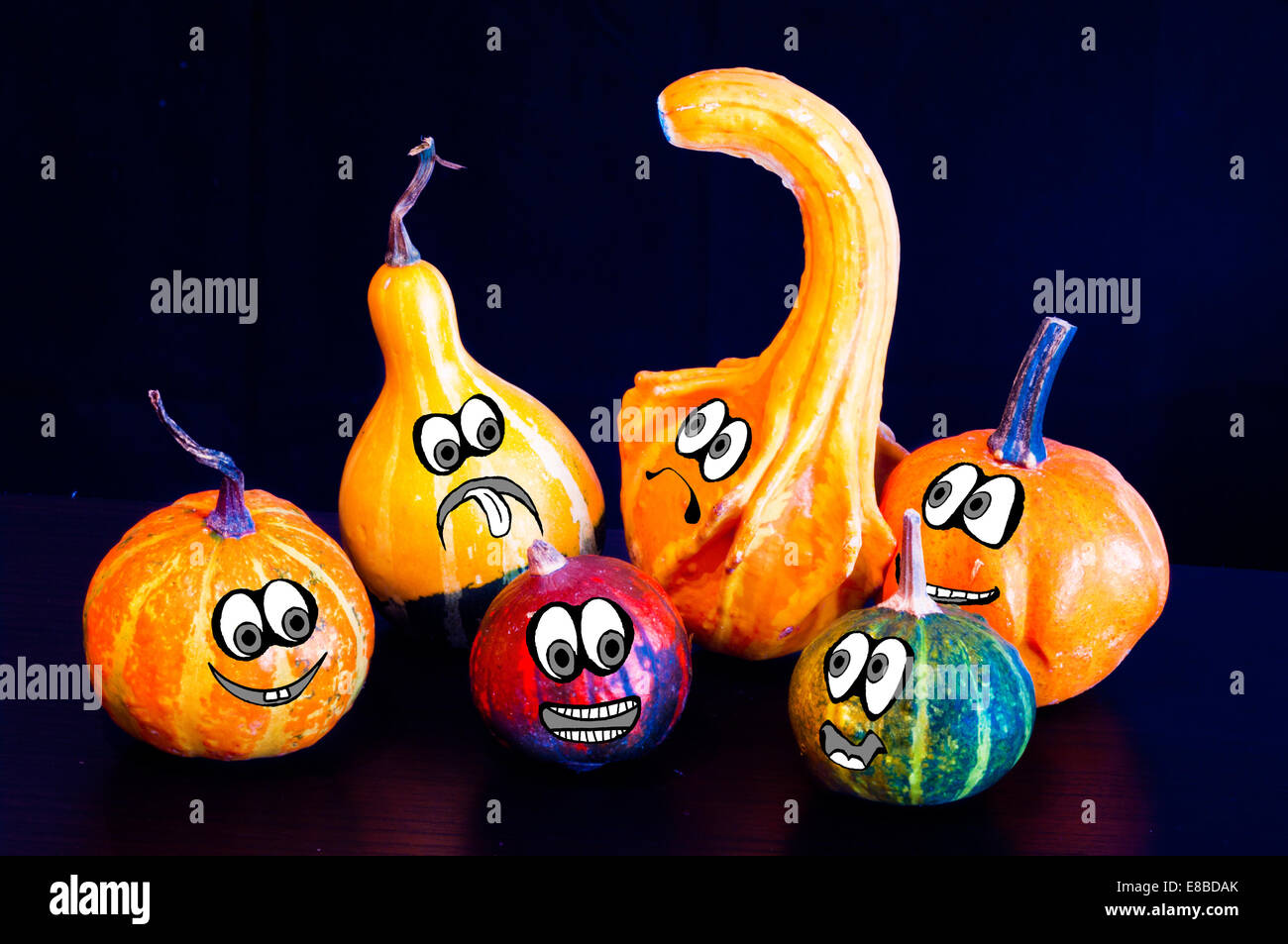 The famous halloween pumpkins get some nice friends who accompany you to make jokes and ask for treats Stock Photo