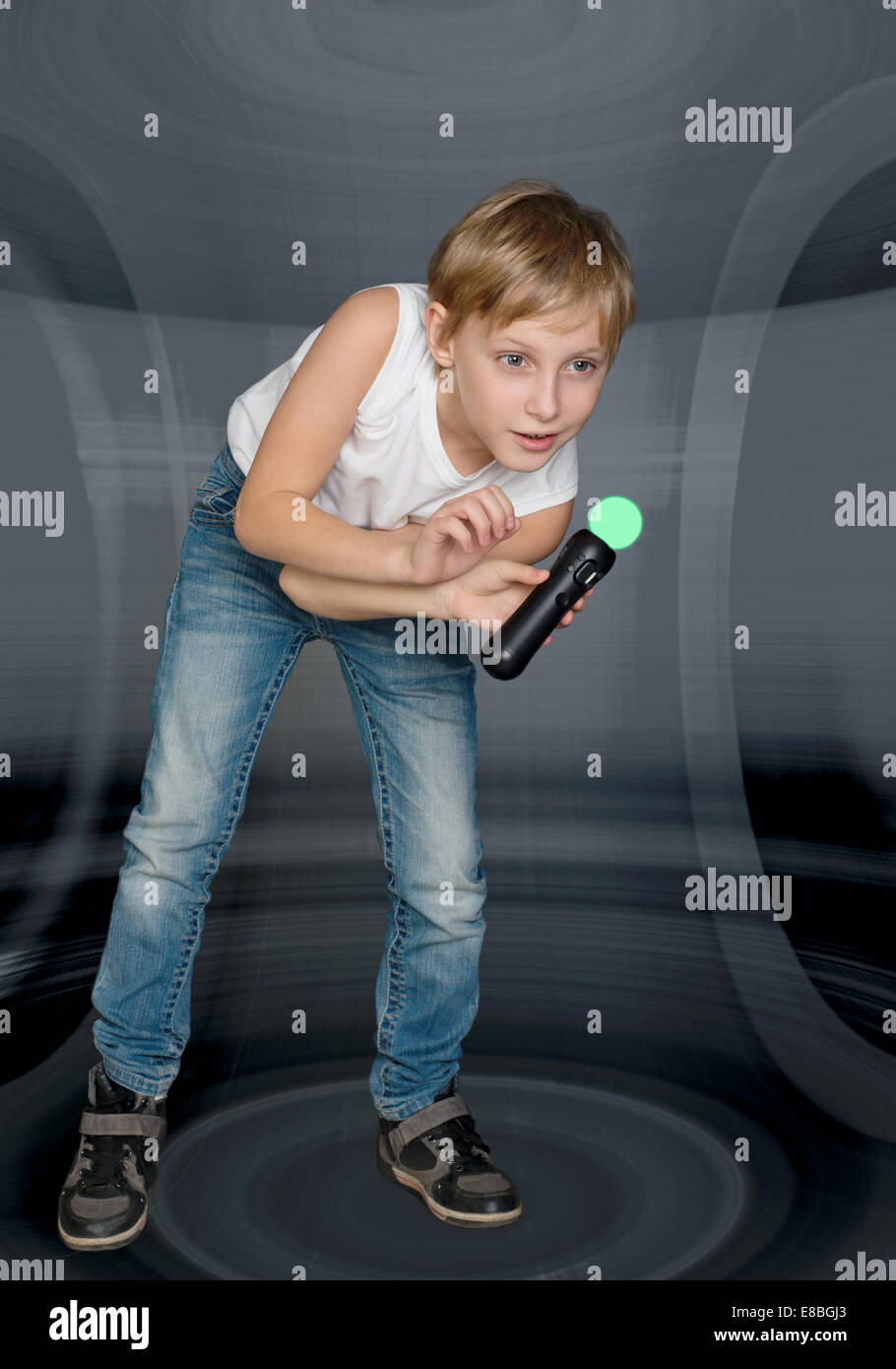 Boy playing a video game controller Stock Photo - Alamy