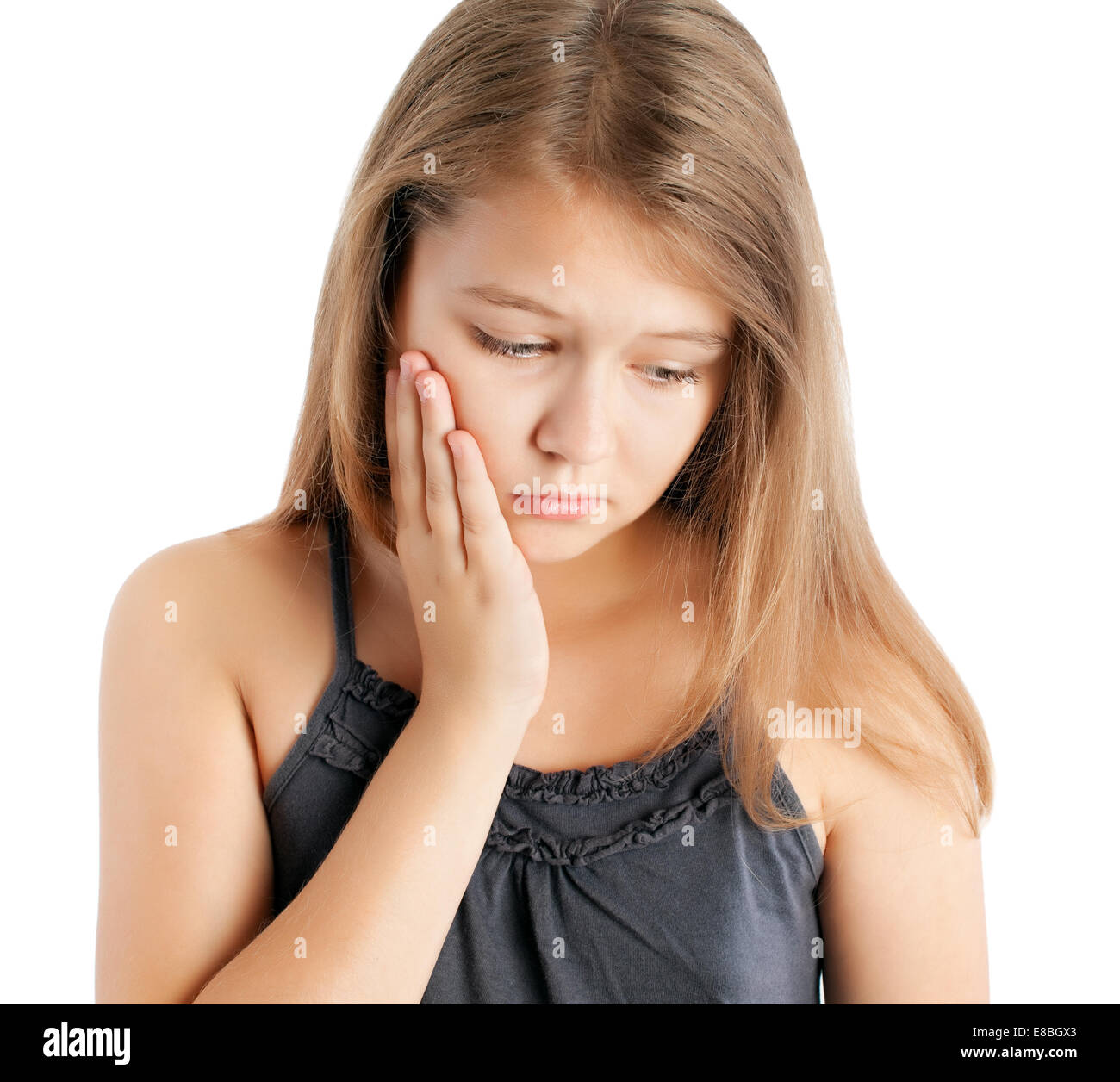 young girl with toothache on white background Stock Photo