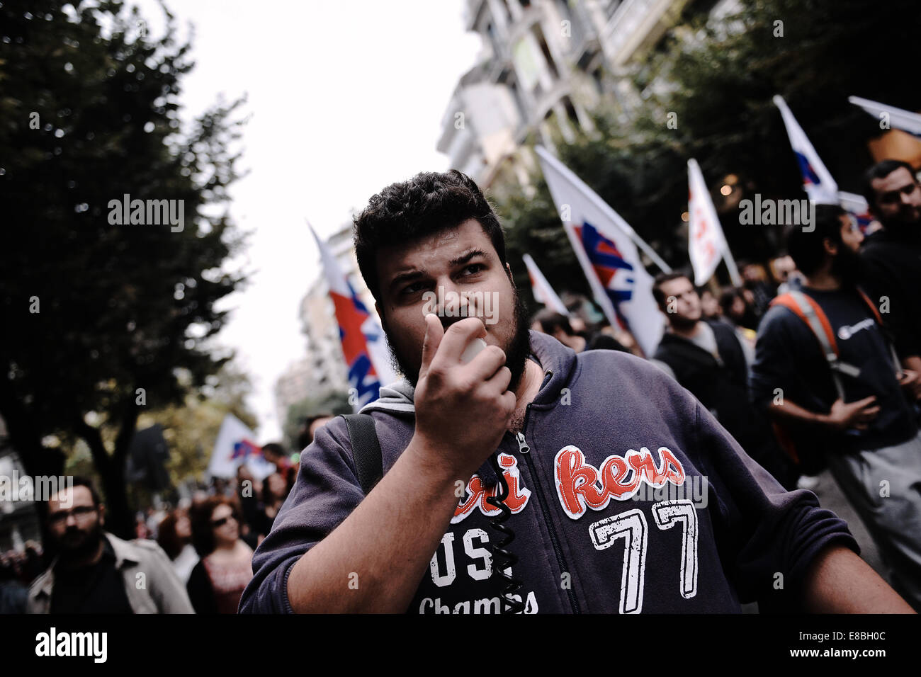 A man shouts slogans during a demonstration at the city of Thessaloniki in northern Greece. Hundreds of people took the streets of Thessaloniki to demonstrate against the unemployment in Greece and the government of Antonis Samaras policy. The demonstration was organized by P.A.ME. Or All Workers Militant Front. Stock Photo