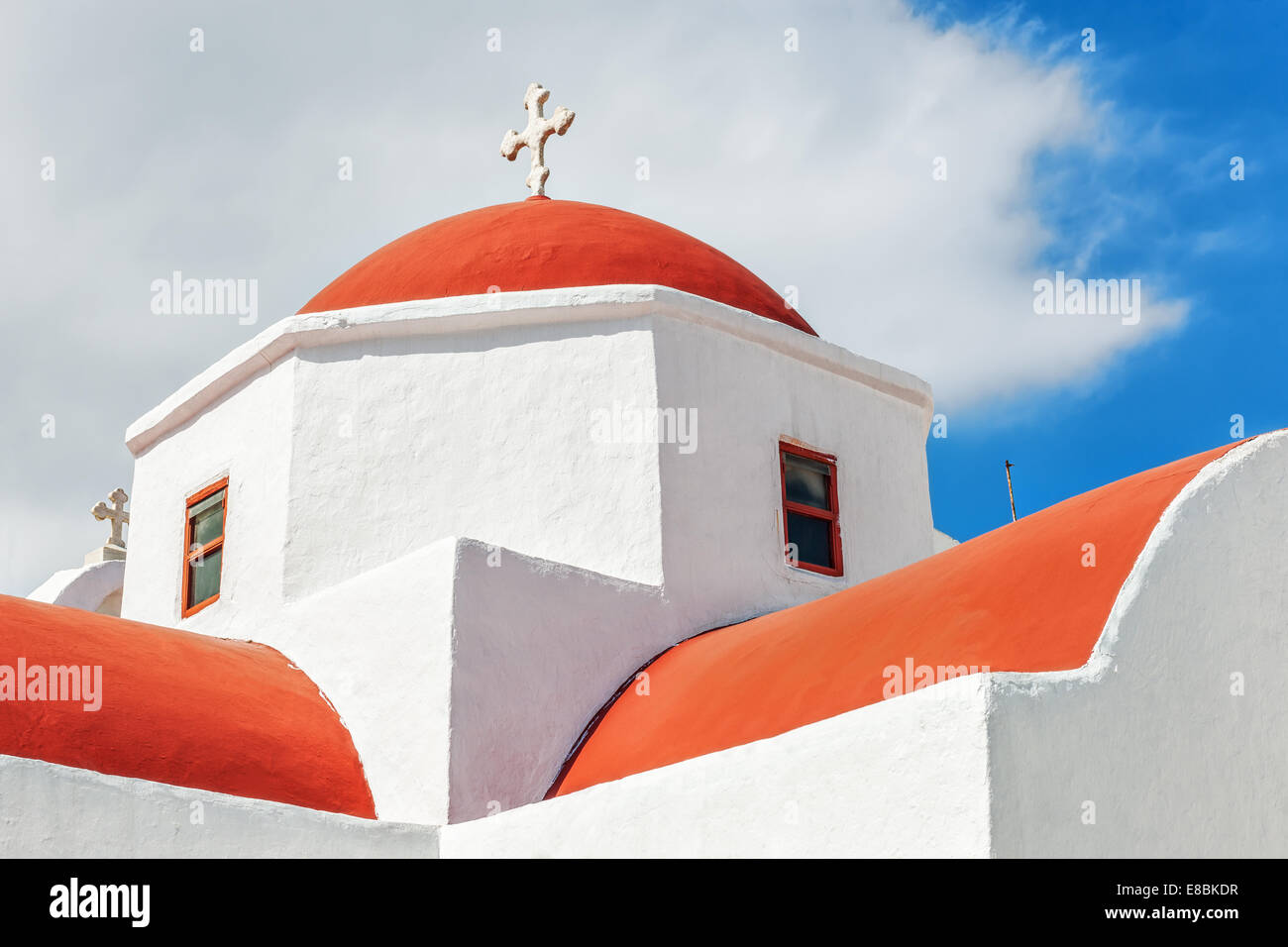 Traditional orthodox white church with red cupola in Mykonos, Greece, Europe Stock Photo
