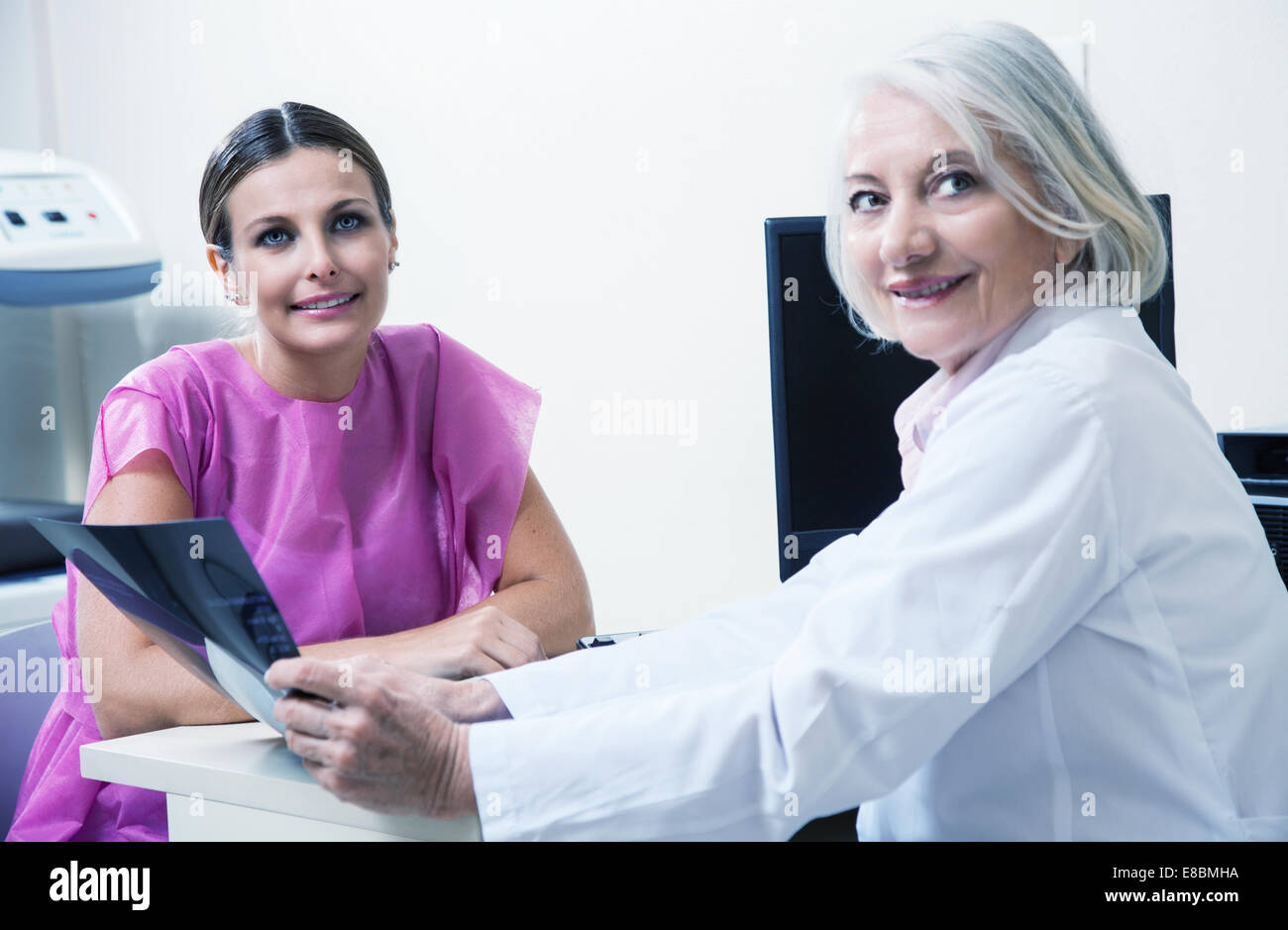Young female doctor patient talking hi-res stock photography and images ...