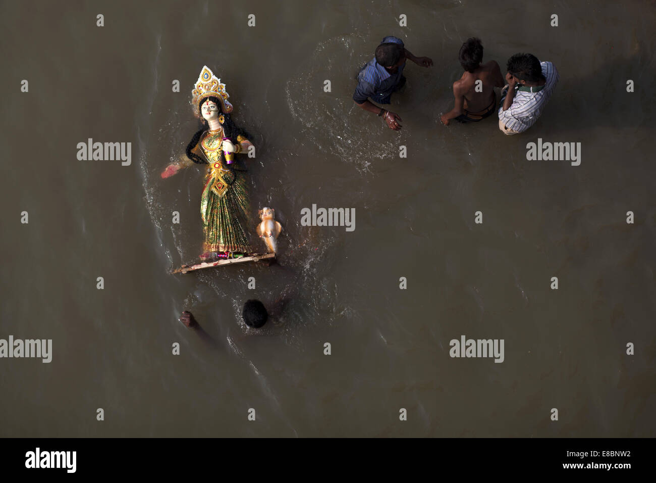 Dhaka, Bangladesh. 4th Oct, 2014. Bangladeshi Hindu devotees immerse an ...