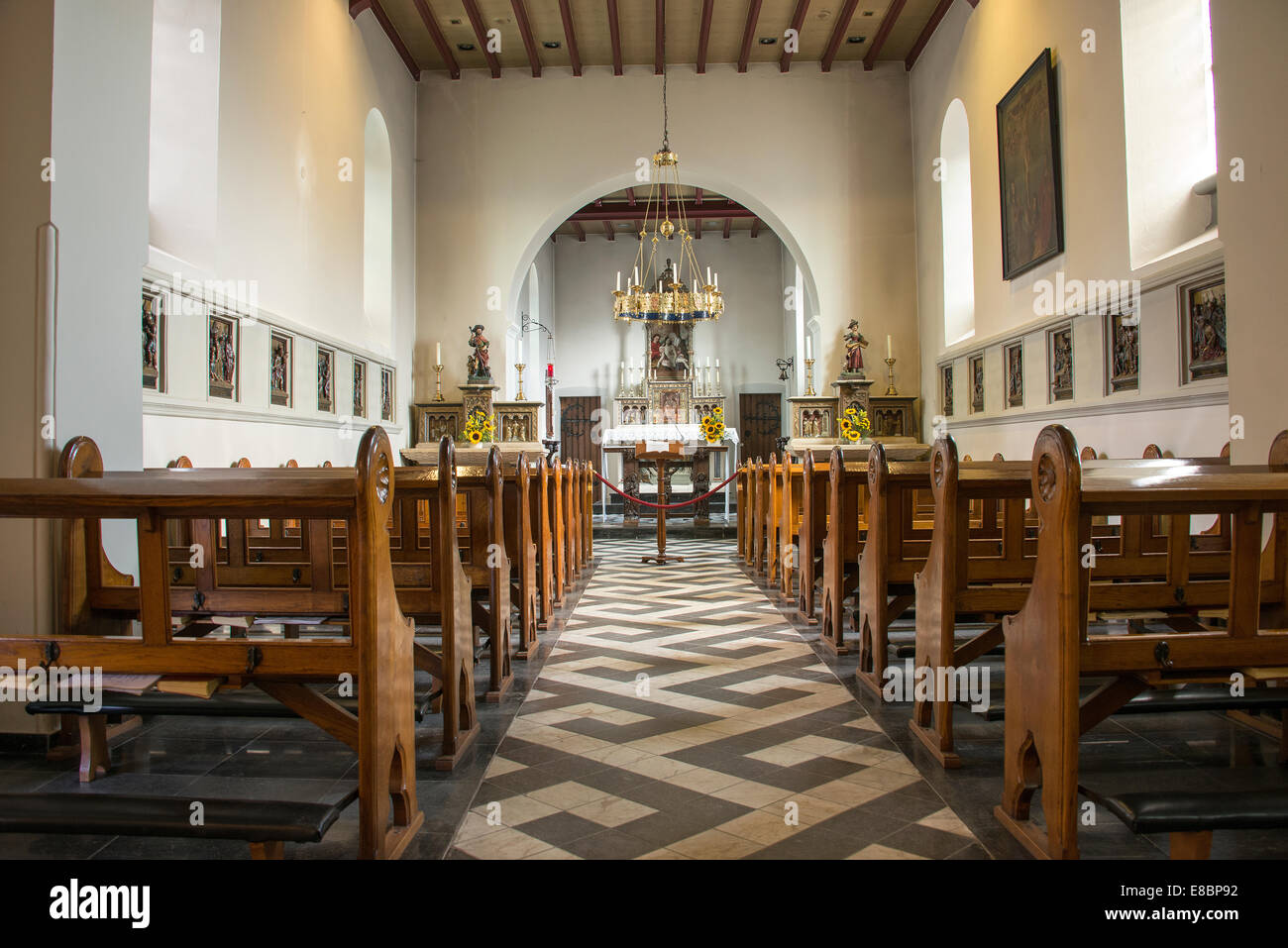 pews and inside church in holset village in holland Stock Photo