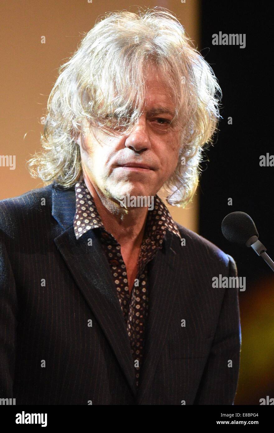 Hattingen, Germany. 03rd Oct, 2014. Musician Bob Geldof gives the laudatory speech for musician Quincy Jones who won in the category 'Charity' at the 10th Steiger Awards in Hattingen, Germany, 03 October 2014. Photo: Henning Kaiser/dpa/Alamy Live News Stock Photo