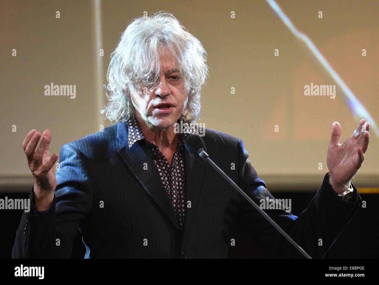 Hattingen, Germany. 03rd Oct, 2014. Musician Bob Geldof gives the laudatory speech for musician Quincy Jones who won in the category 'Charity' at the 10th Steiger Awards in Hattingen, Germany, 03 October 2014. Photo: Henning Kaiser/dpa/Alamy Live News Stock Photo