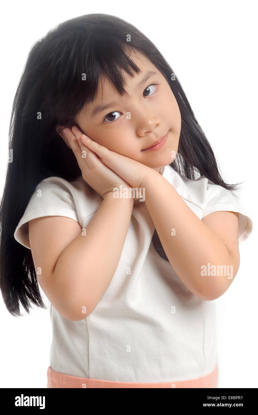 Portrait of cute little girl on white background Stock Photo - Alamy