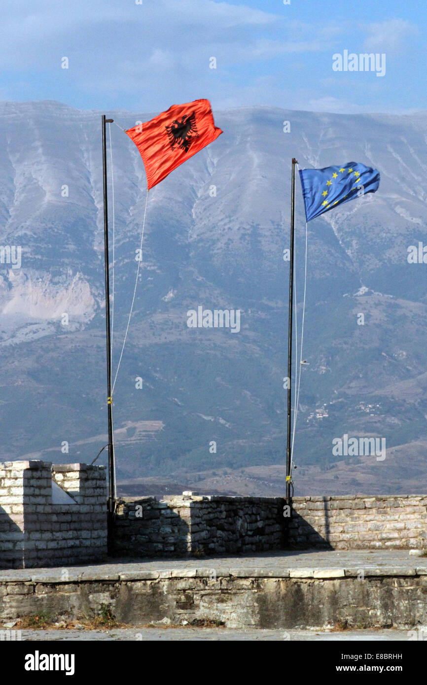 The Albanian and EU flags flying side by side at Gjirokastra castle, Albania Stock Photo
