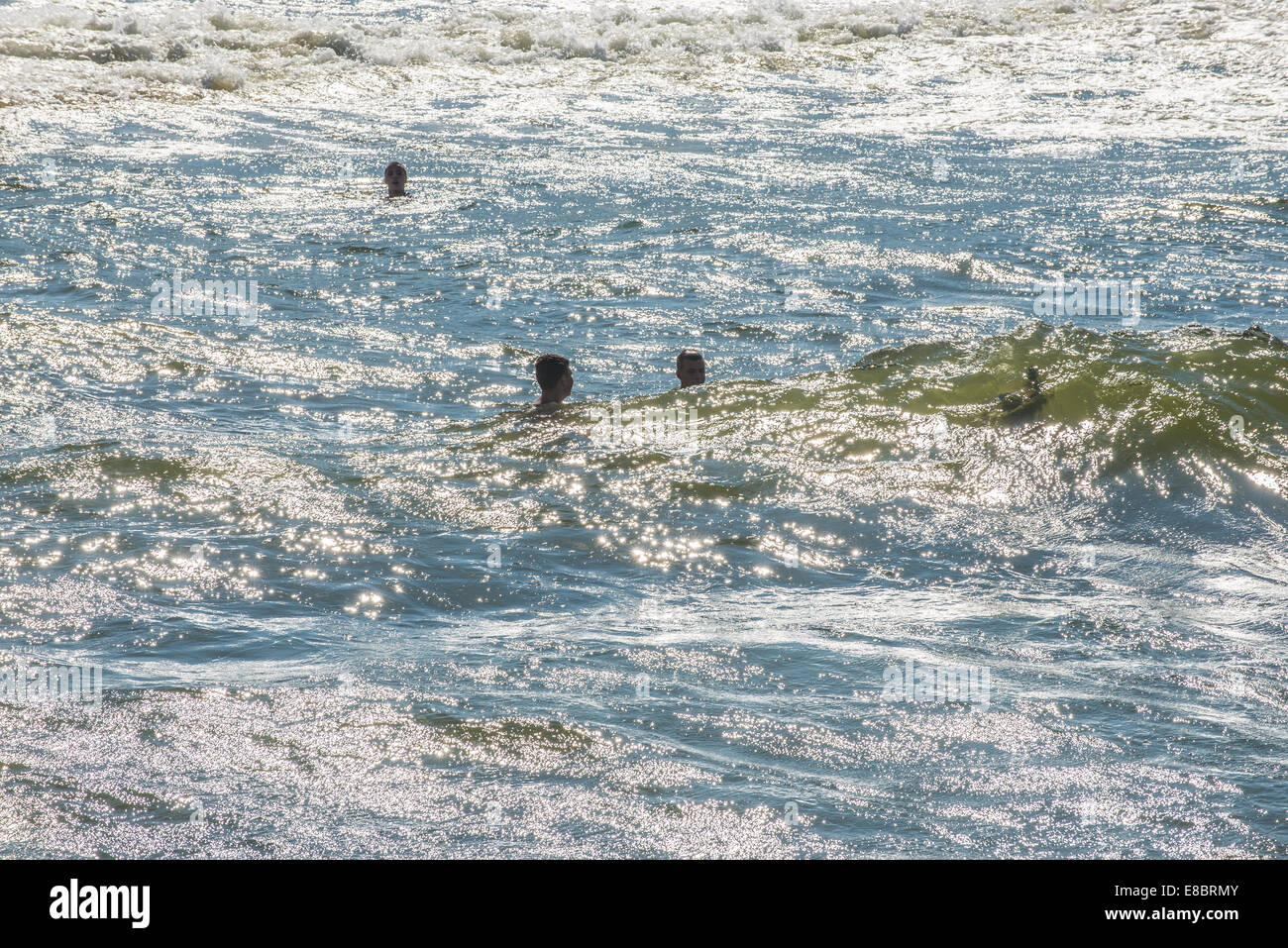 young people swimming in Baltic Sea in Gdansk, Poland Stock Photo