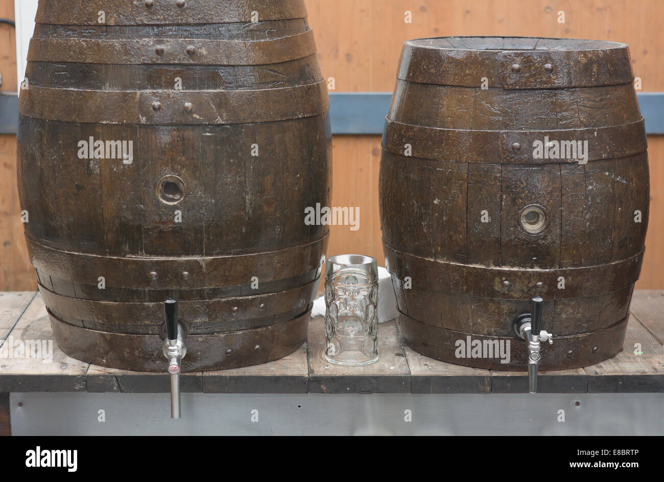 Traditional Beer Barrels with Glass at the Oktoberfest in Munich Stock Photo