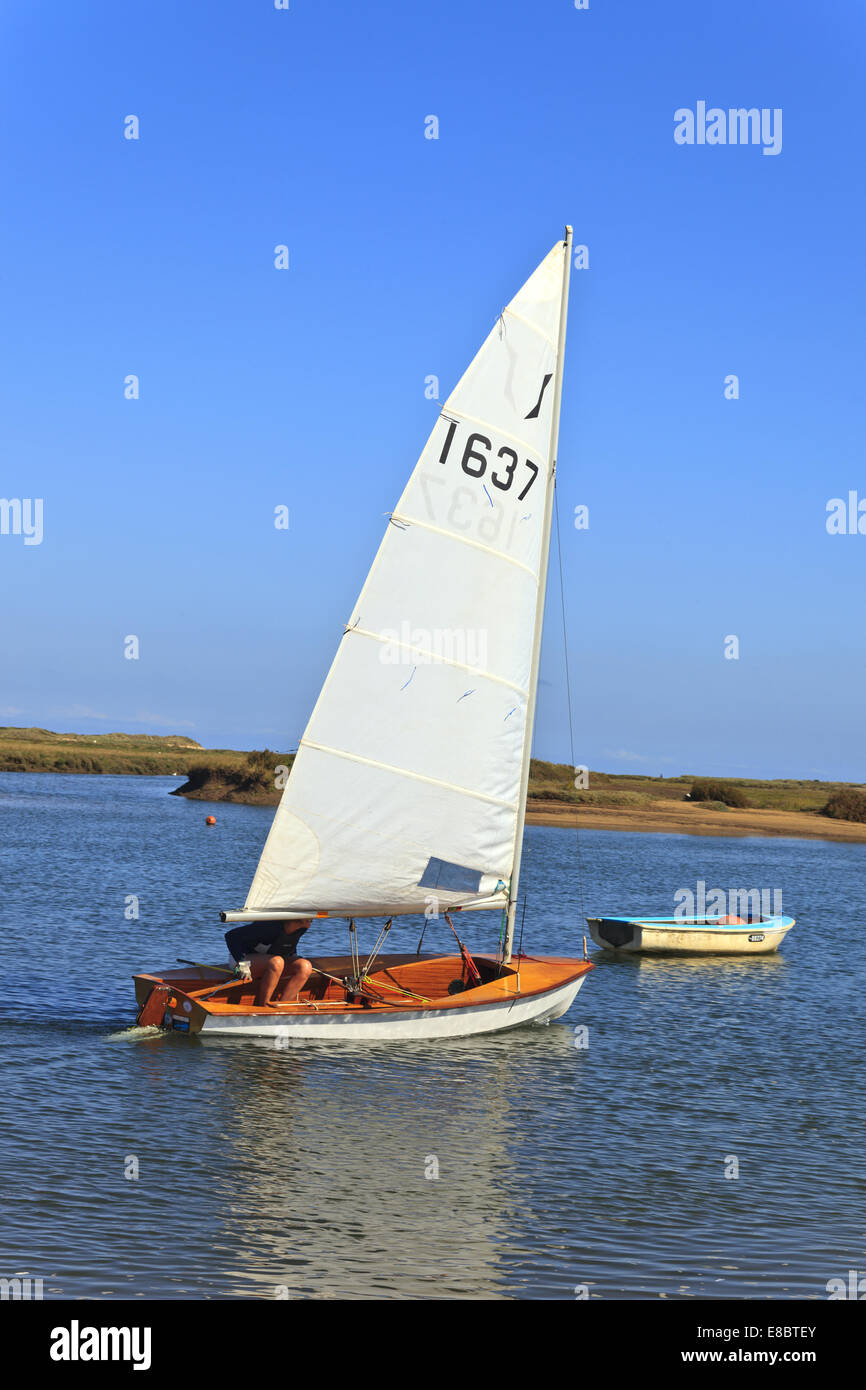 Woman Dinghy Sailing on the creek at Burnham Overy Staithe, North