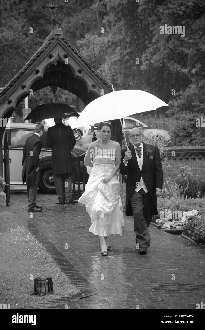Bride and father arriving Stock Photo