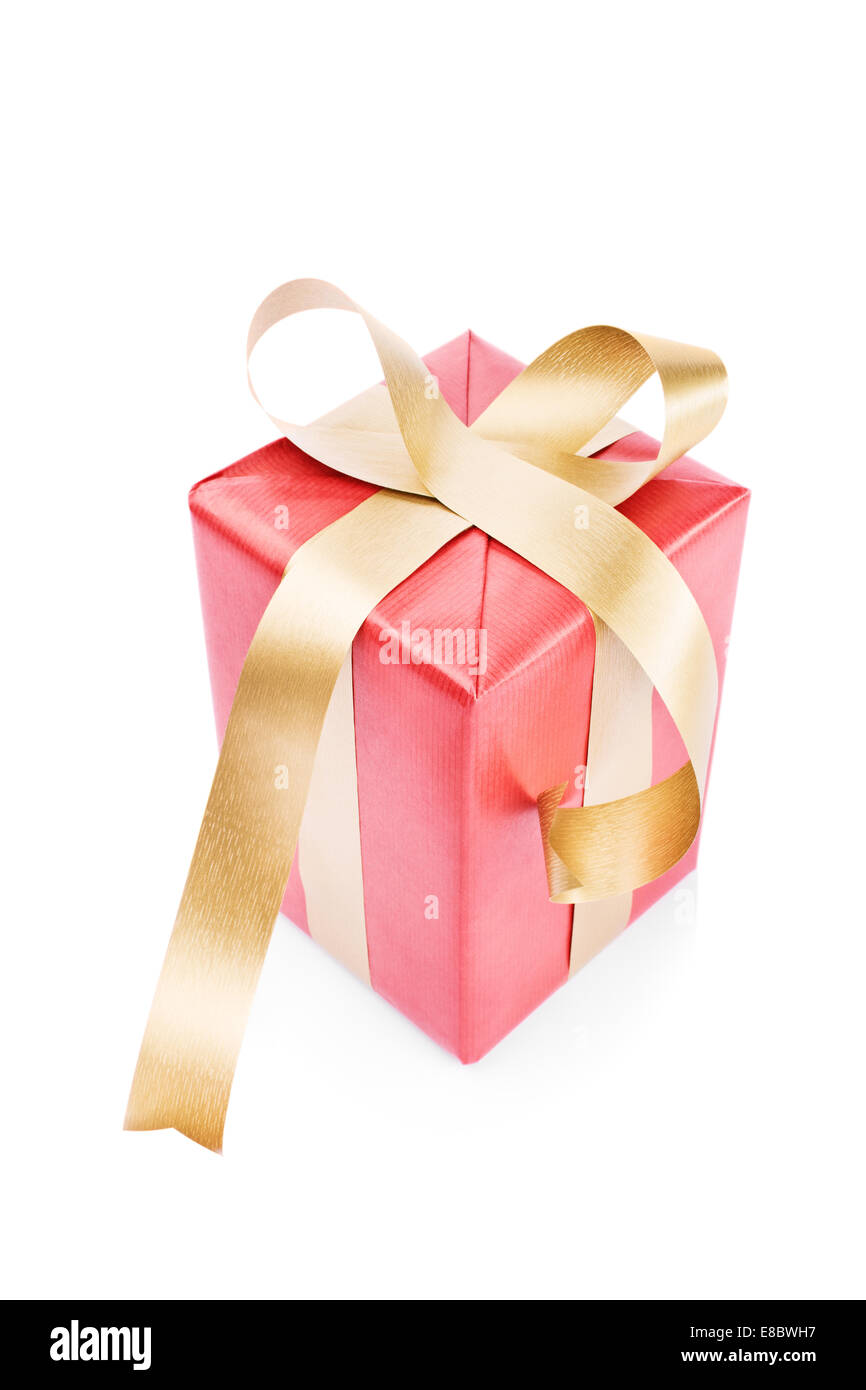 Gift wrapped in red with golden ribbon, isolated on white background