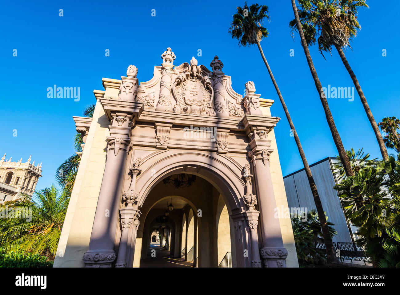 Walking path leading into an arched structure at Balboa Park. San Diego,California, United States.. Stock Photo
