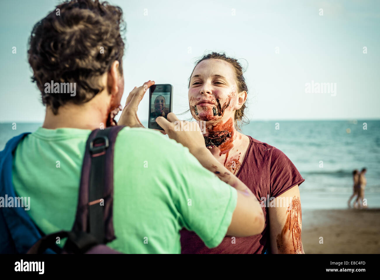 Sitges, Spain. 4th Oct, 2014. Zombies photograph each other with their smart phone in front of the Sitges Zombie Walk 2014 Credit: Matthias Oesterle/ZUMA Wire/ZUMAPRESS.com/Alamy Live News Stock Photo